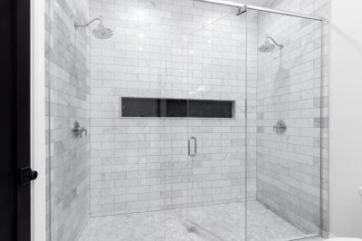 Rain Shower Head in a Frameless Enclosure